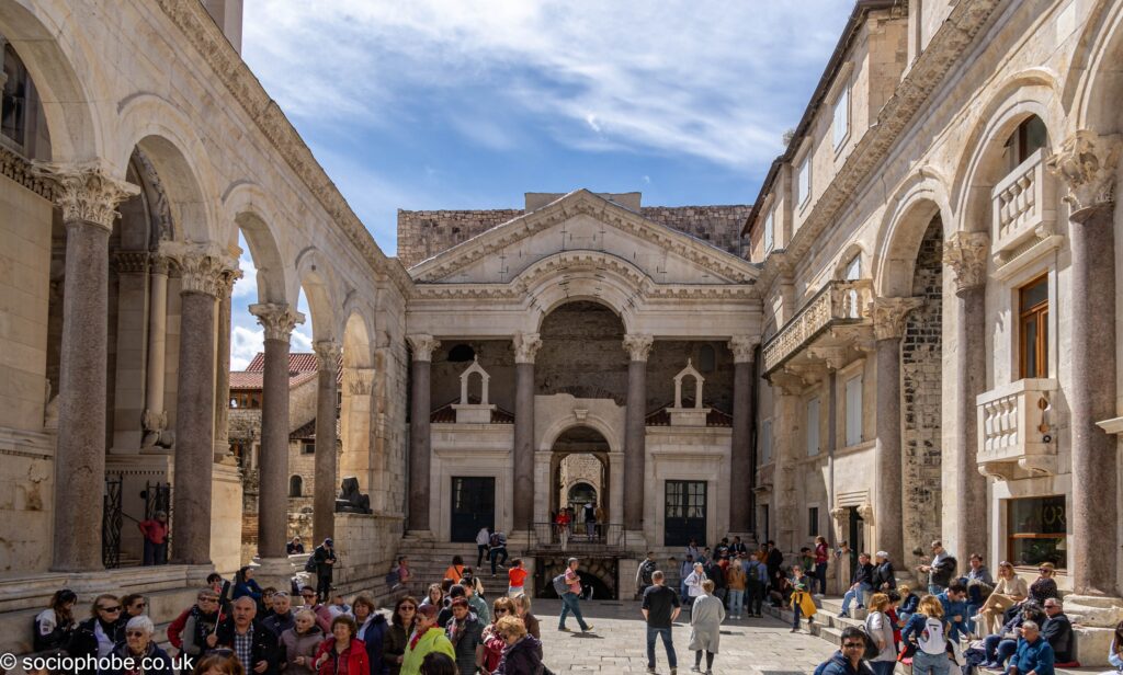 The Peristile of Diocletian's Palace, the cathedral on the left, entrance to the Vestibule up the steps straight ahead, entrance to the basements straight ahead and down the steps, ticket office, Treasury and Temple of Jupiter on the left.